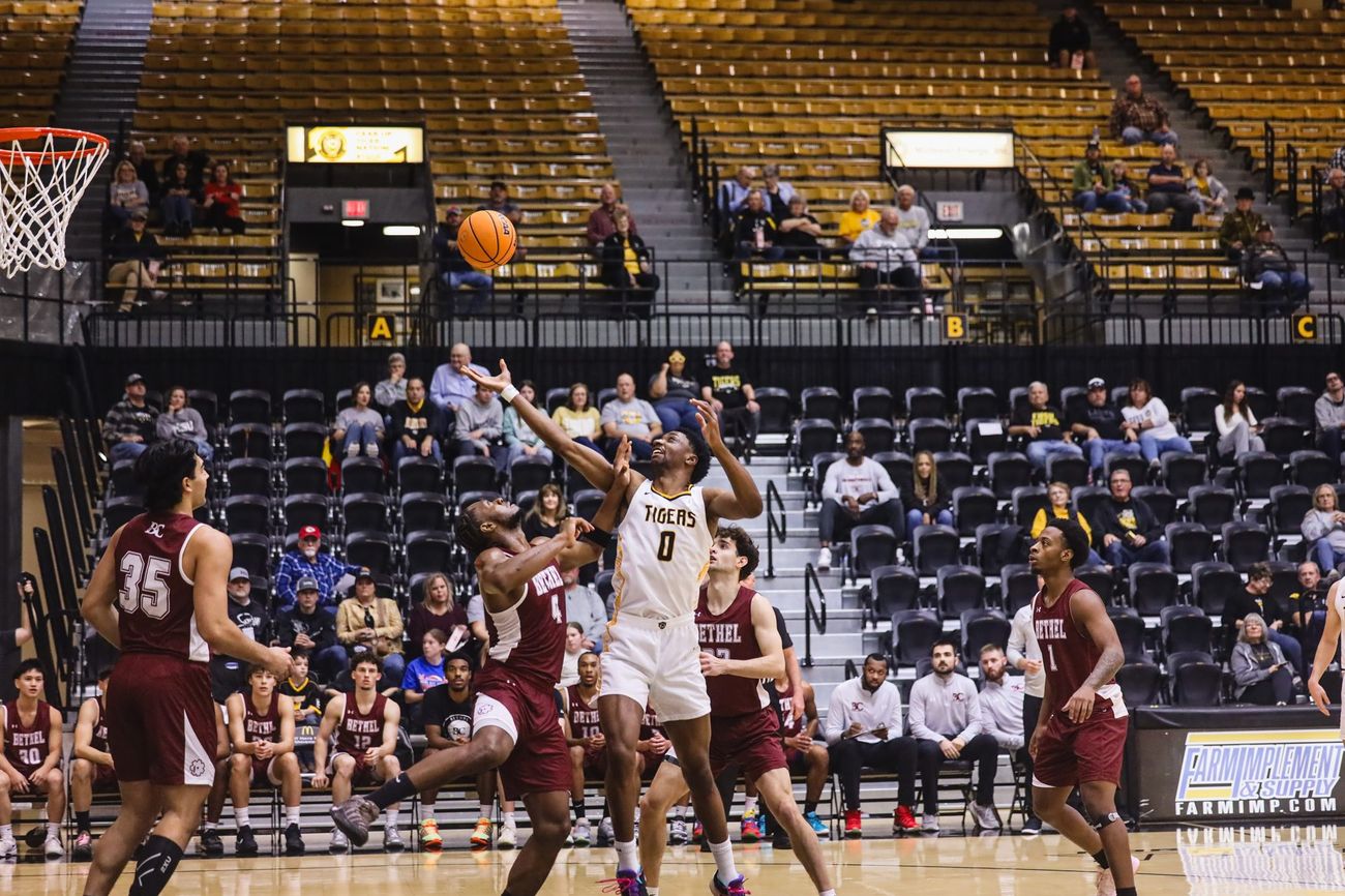 Men's basketball against Bethel, a shot going up over the defense